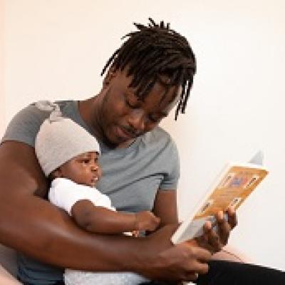 dad and infant reading